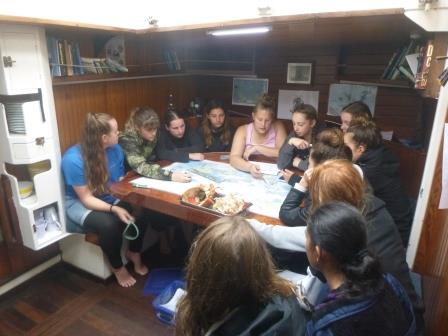 Trainees gathered around the saloon