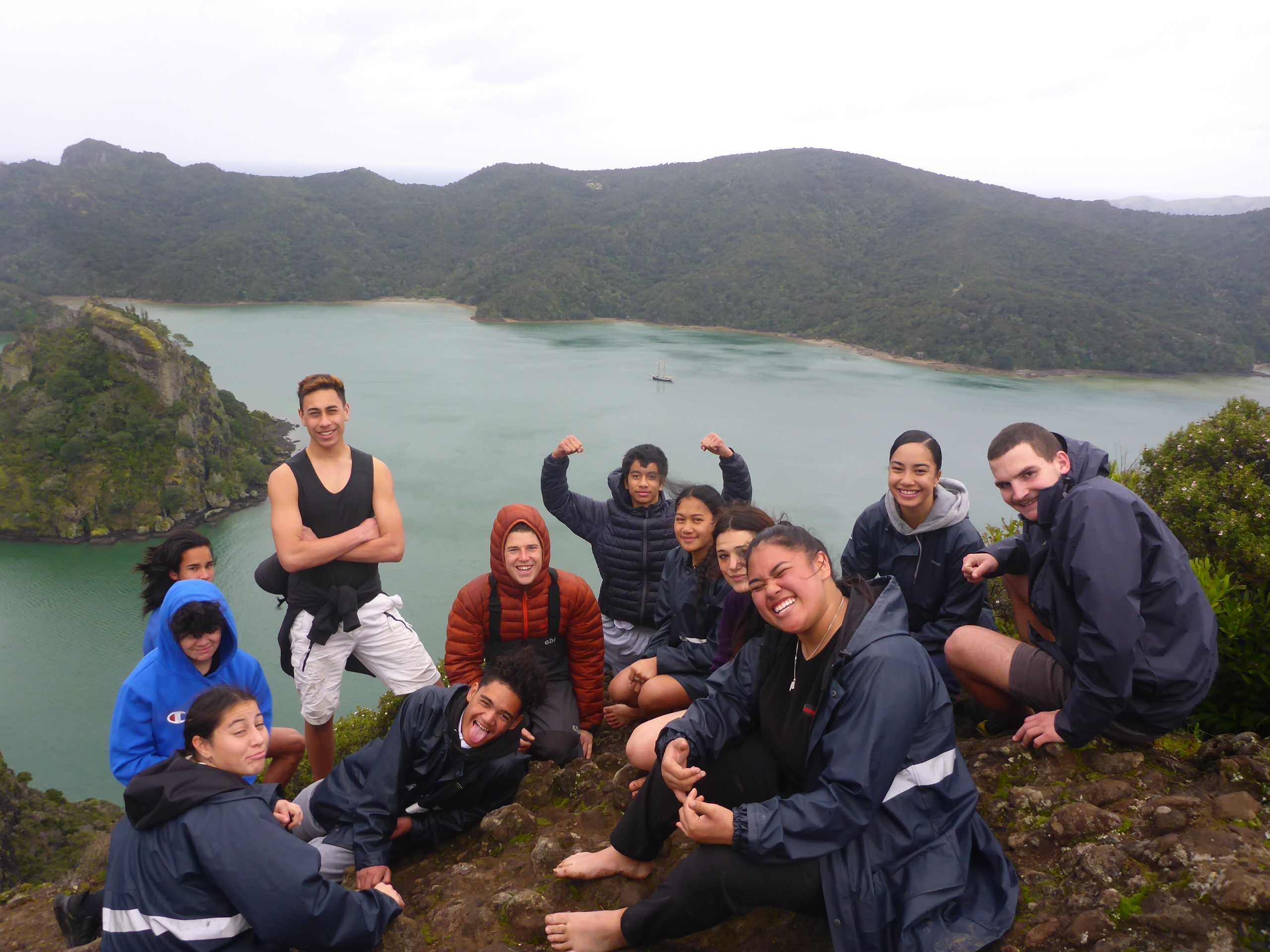 group of travelers behind a scenic view